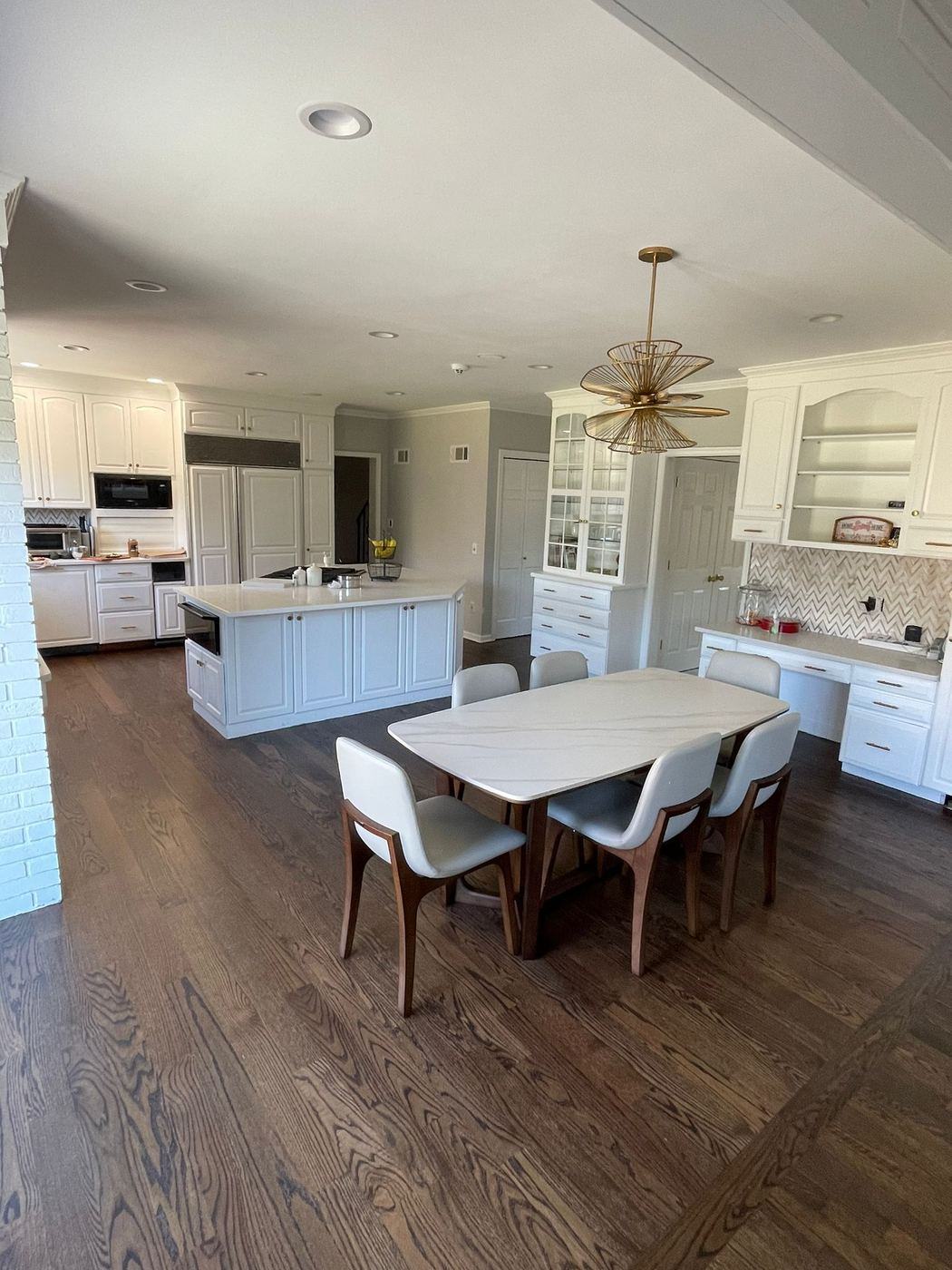 White cabinet kitchen remodel with island