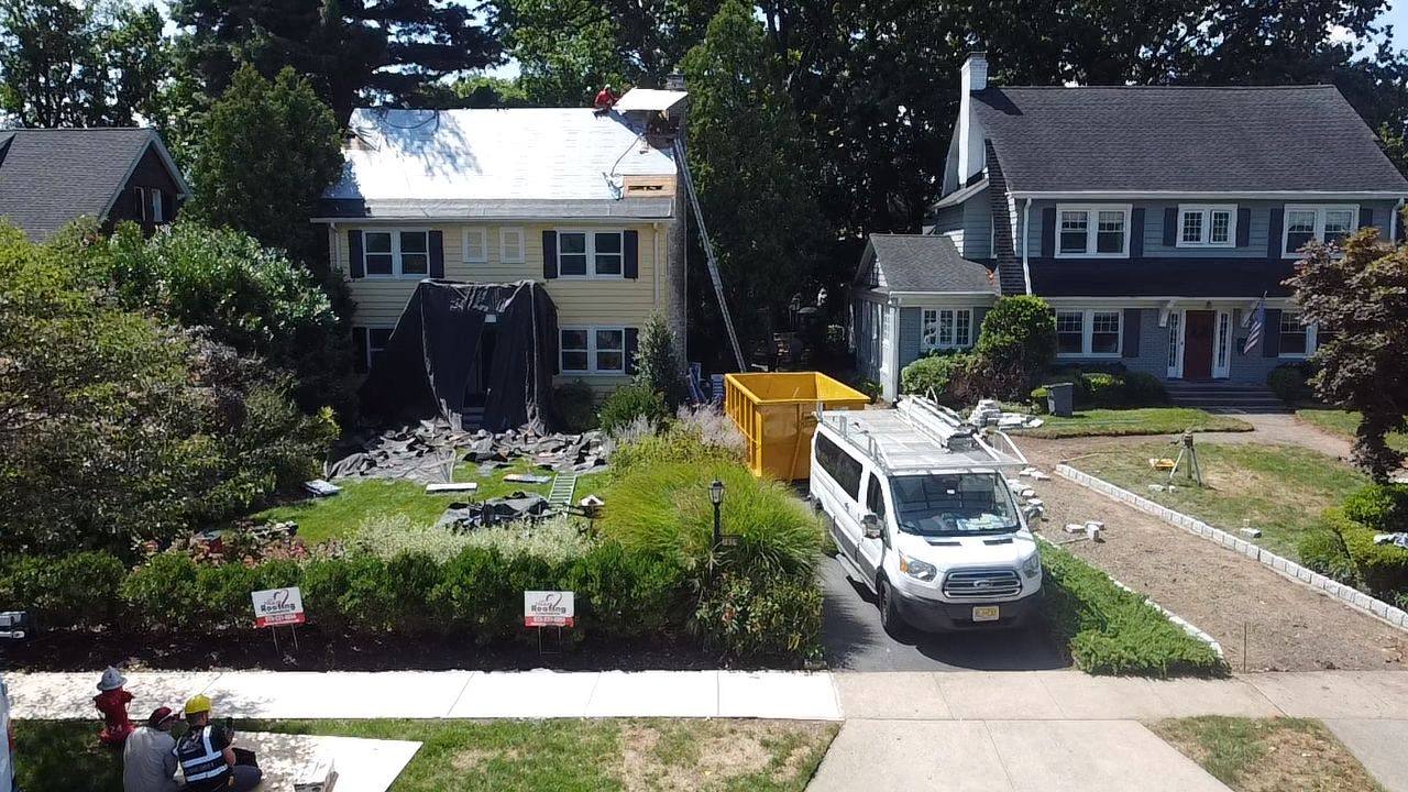 Colonial home roof replacement in progress